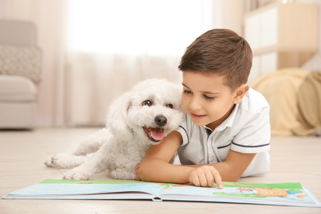 boyreadingtodog.jpg